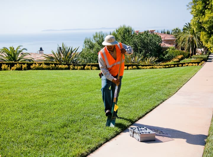 Landscaper digging